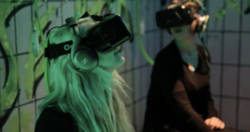 Two people wearing VR headsets